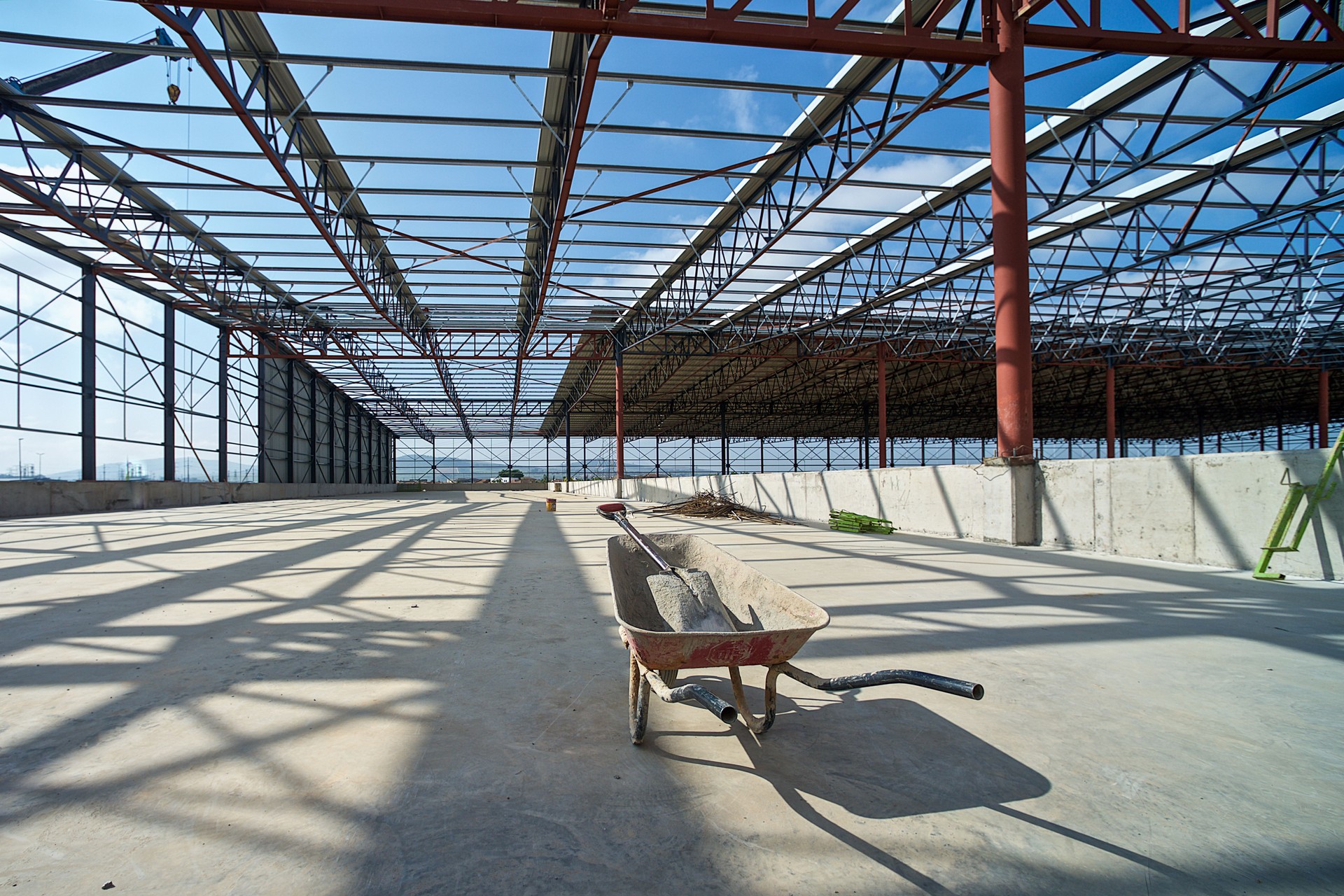 Warehouse Construction Site Wheelbarrow and shovel